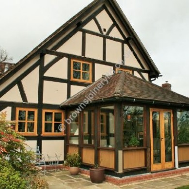 Cottage Oak Windows in a conservatory attached to a timber framed cottage made by Browns Joinery Leominster